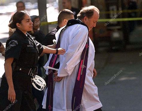Priest arrested with 13.